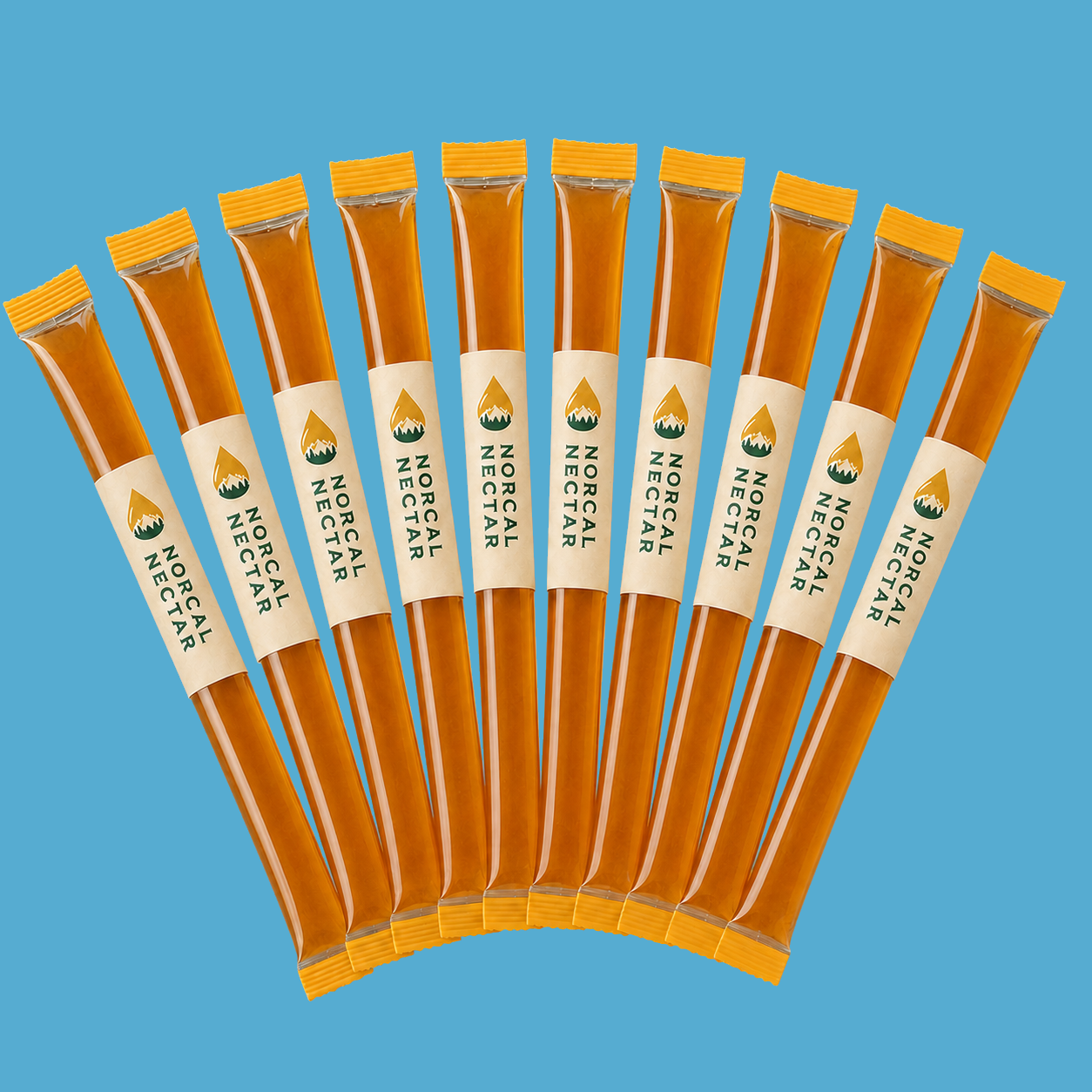 A fan of NorCal Nectar raw honey sticks, each wrapped in a cream label